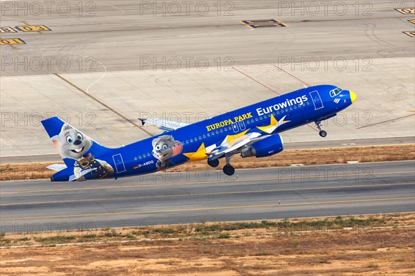 A Eurowings Airbus A320 with the registration D-ABDQ and the special livery Europa Park takes off from the airport in Palma de Majorca