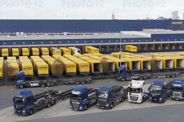 Parking lot with articulated lorry and semi-trailer