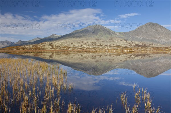 Stygghoin reflected in the water of the lake in autumn