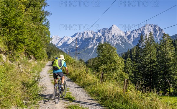 Cyclist on bike tour with mountain bike