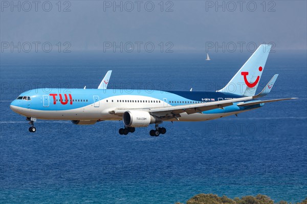 A TUI Boeing 767-300ER with the registration G-OBYH lands at Rhodes Airport