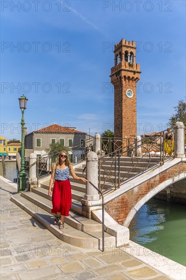 Young woman at a canal