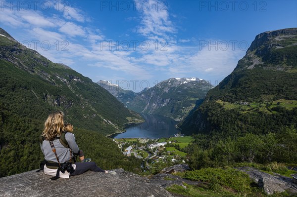 Mother with child overlooking Geirangerfjord