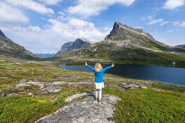 Little girl enjoying the view over a glacial valley