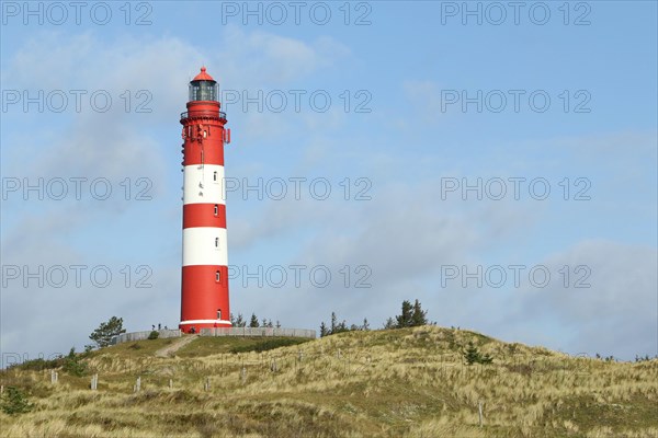 Lighthouse in dune landscape