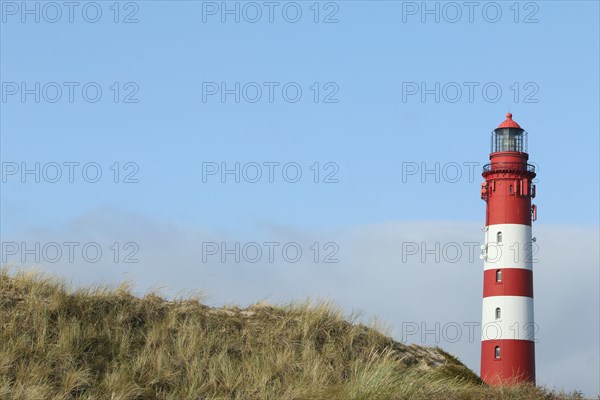 Lighthouse in dune landscape