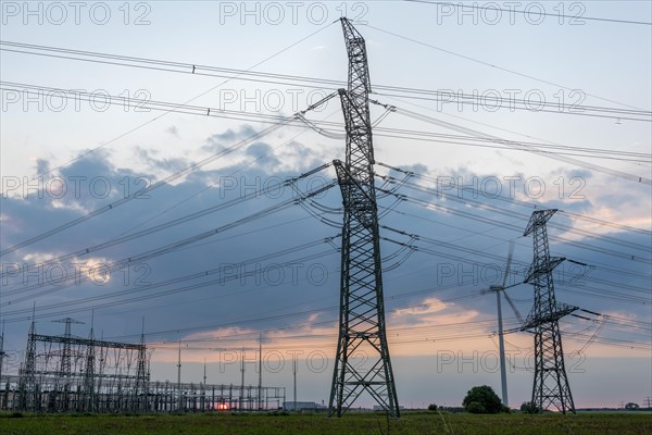 Power pylons at sunset