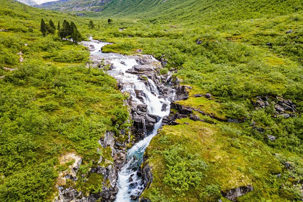 Waterfall running through the glacial valley