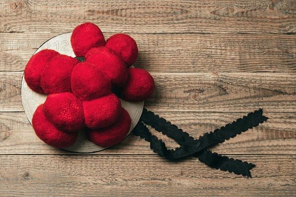 Original Black Forest Bollen hat on rustic wooden background