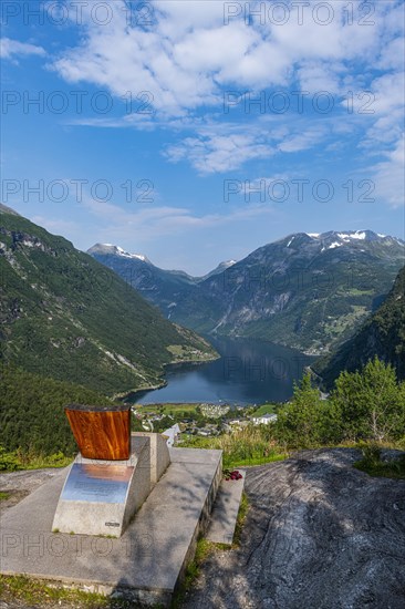 Design chair on a overlook over Geirangerfjord