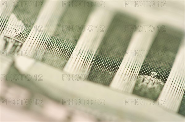 Macro of the back of the U.S. five dollar bill showing lincoln statue