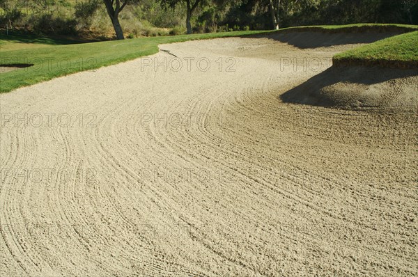 Abstract of golf course bunkers on a spring day