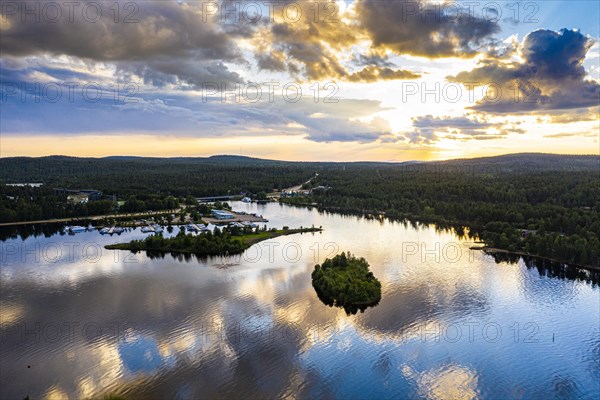 Clouds reflecting at sunset on Lake Inari