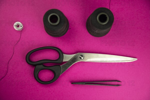 Black tailoring accessories as scissors