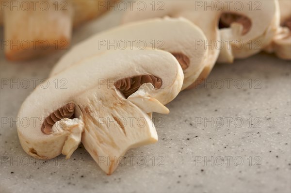 Delicious fresh sliced mushrooms on a cutting board