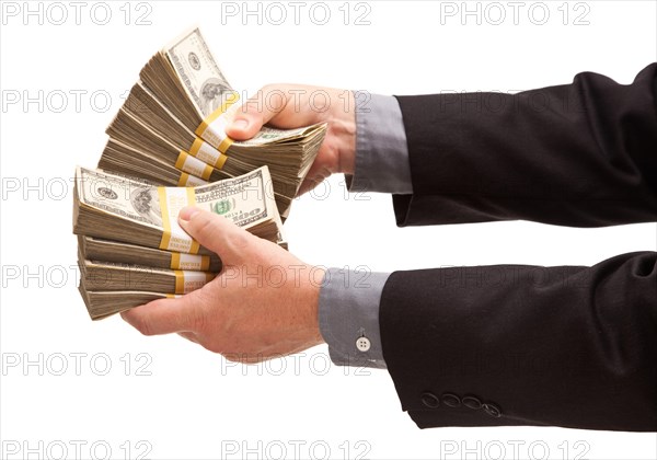 Man handing over hundreds of dollars isolated on a white background