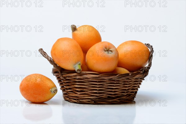 Ripe medlars in baskets