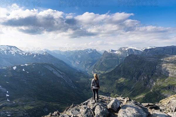 Woman standing on Dalsnibba View point