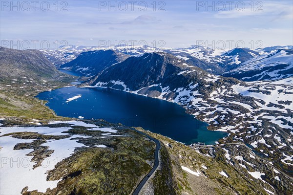 Aerial of a mountain lake in the mountains over Geirangerfjord