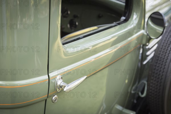Detail abstract of beautiful vintage car door and handle