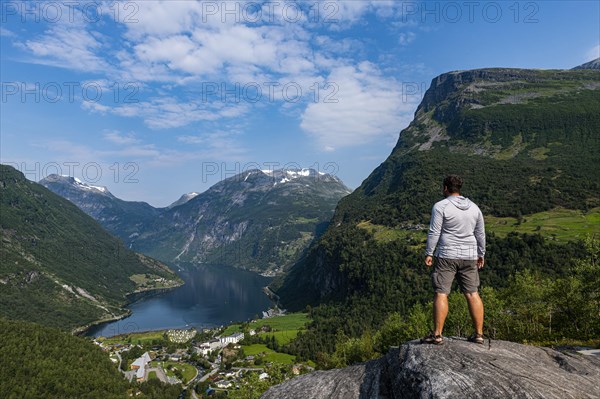 Man overlooking Geirangerfjord