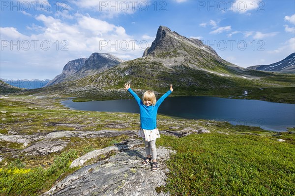 Little girl enjoying the view over a glacial valley