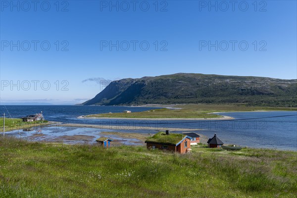 Remote little bay and settlement along the road to the Nordkapp