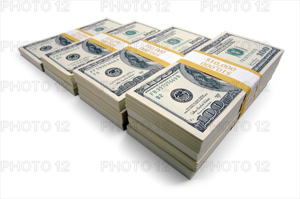Stacks of ten thousand dollar piles of one hundred dollar bills