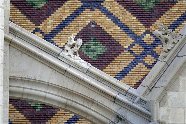 Roof covered with coloured shingles