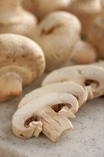 Delicious fresh sliced mushrooms on a cutting board