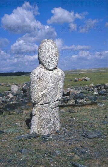 Ancient stone stele of a Turkic warrior or Balbal near Khurgan Lake