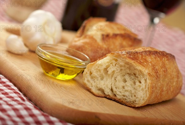 Sourdough bread on cutting board with narrow depth of field