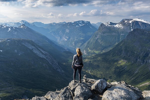 Woman standing on Dalsnibba View point