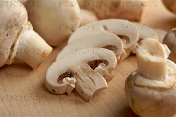 Delicious fresh sliced mushrooms on a cutting board