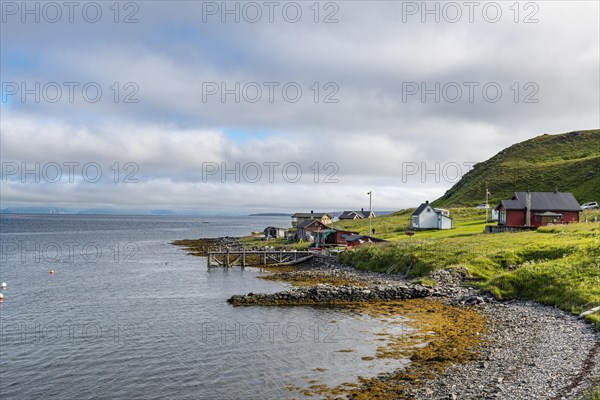 Remote little bay and settlement along the road to the Nordkapp