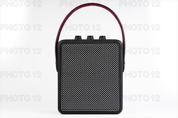 Black modern bluetooth loudspeaker isolated on white background