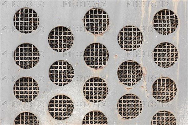 Abstract vintage metal grid circles background