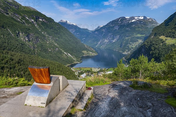 Design chair on a overlook over Geirangerfjord