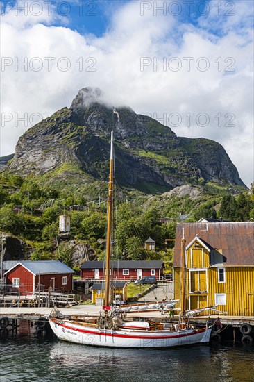 Sailing boat in the harbour of the little fishing village of Nusfjord