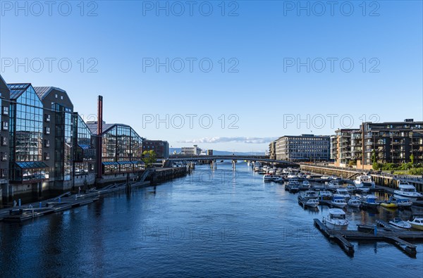 Modern business complexes along the Nidelva