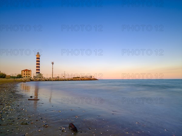 Lighthouse Faro and Adriatic Sea in the evening light