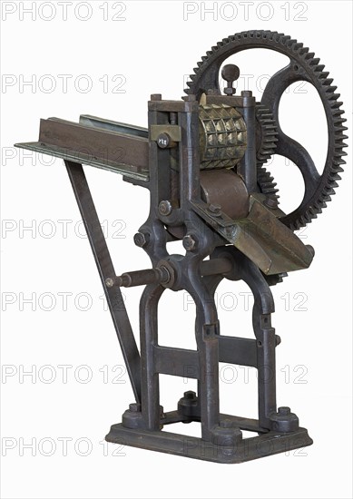 Candy machine of the 1920s on white background