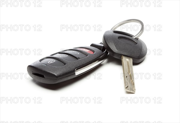 Modern car key and remote isolated on a white background