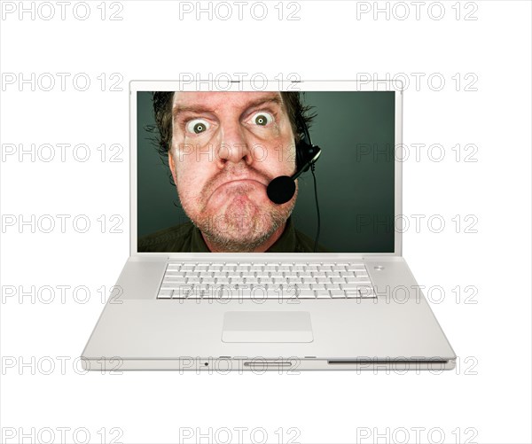 Grumpy customer service man on laptop screen isolated on a white background