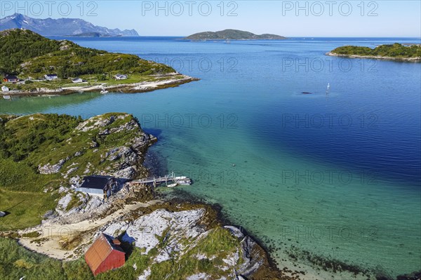 Aerial of a remote little bay and settlement along the road to the Nordkapp