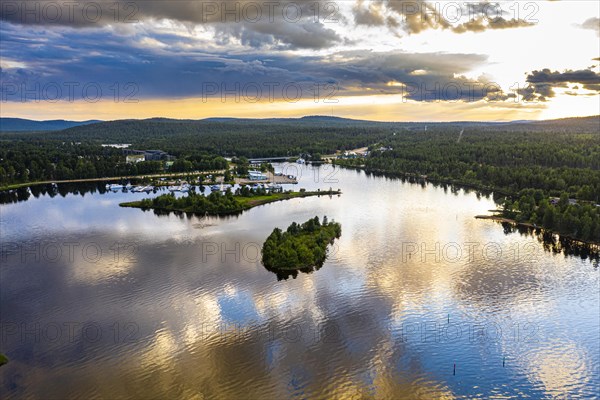 Clouds reflecting at sunset on Lake Inari