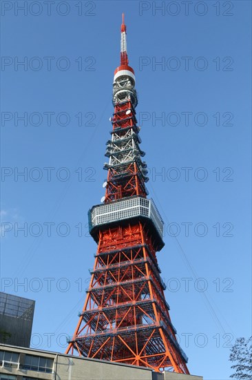 Detail of Tokyo Tower in front of blue sky