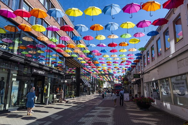 Open Umbrellas hanging over the pedestrian zone of Trondheim
