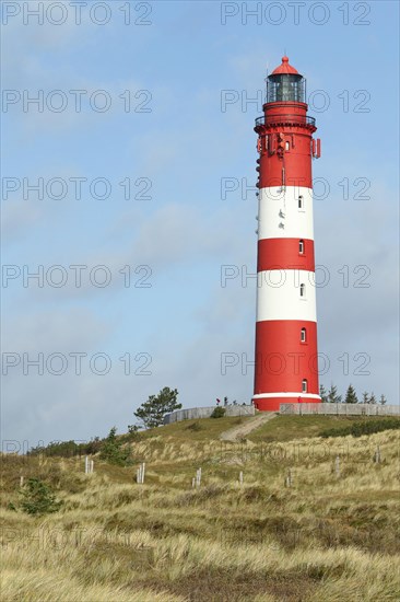 Lighthouse in dune landscape