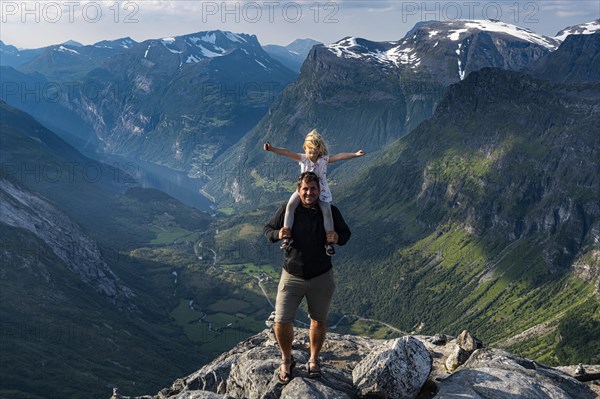 Father with daughter standing on Dalsnibba View point